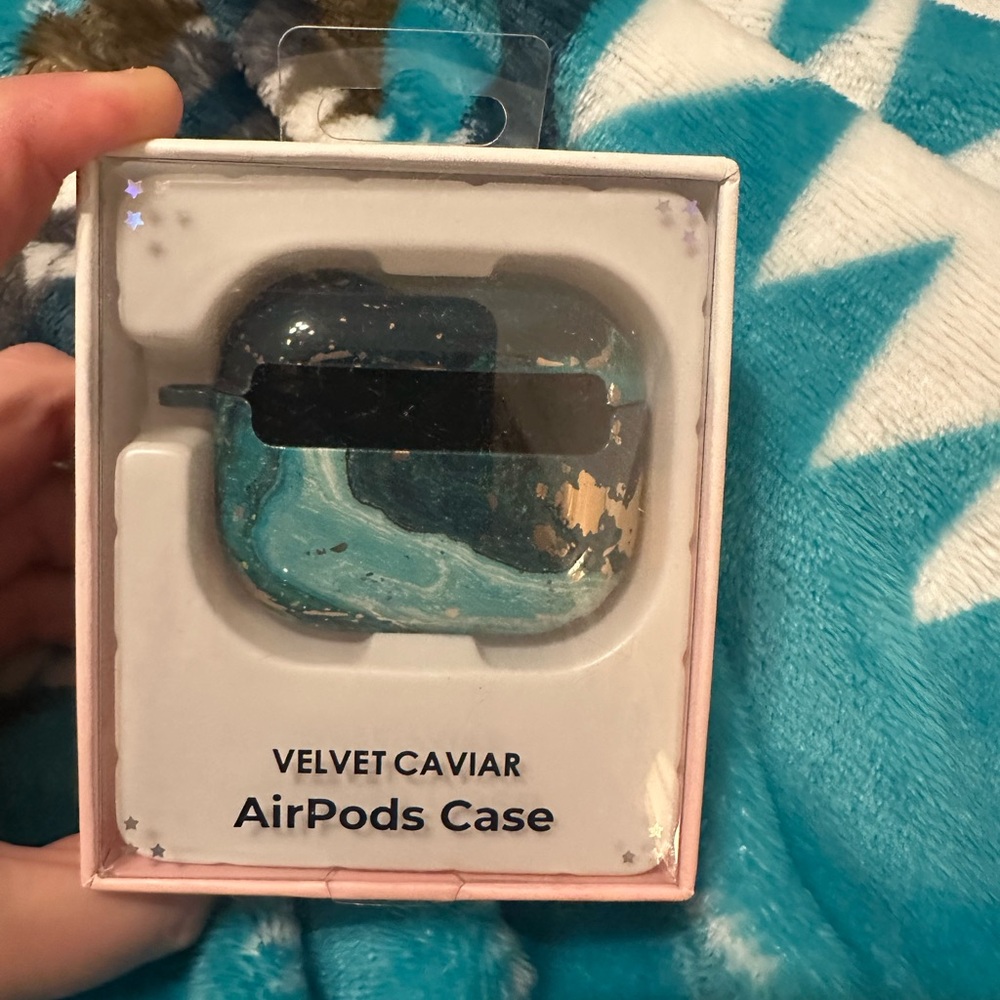 Velvet Caviar AirPods Case with Blue and Gold Accents